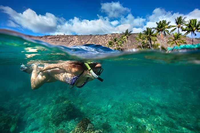 Woman snorkeling in Kealakekua Bay, HI